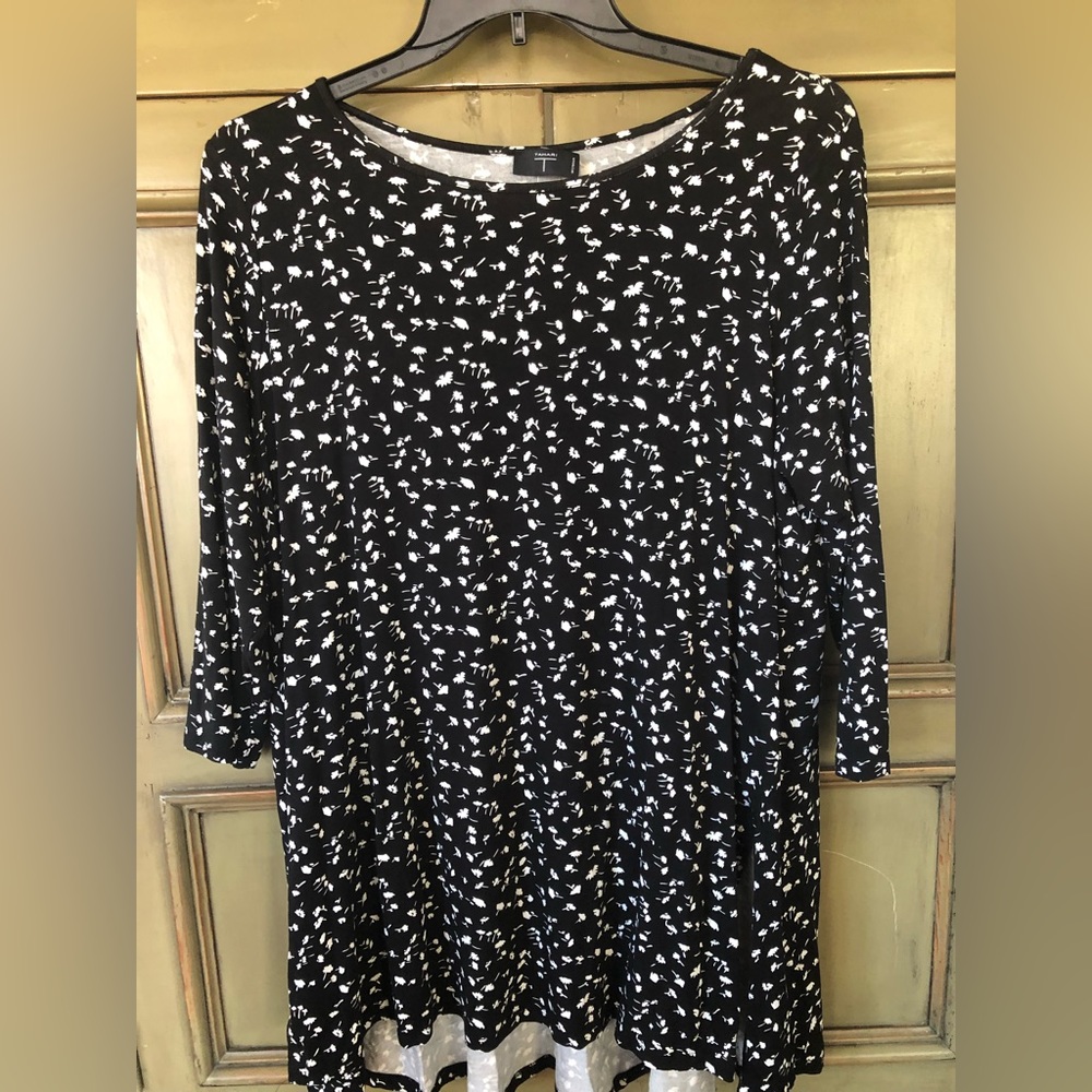 Fun new Tahari shirt that pairs perfectly with black tights or jeans.